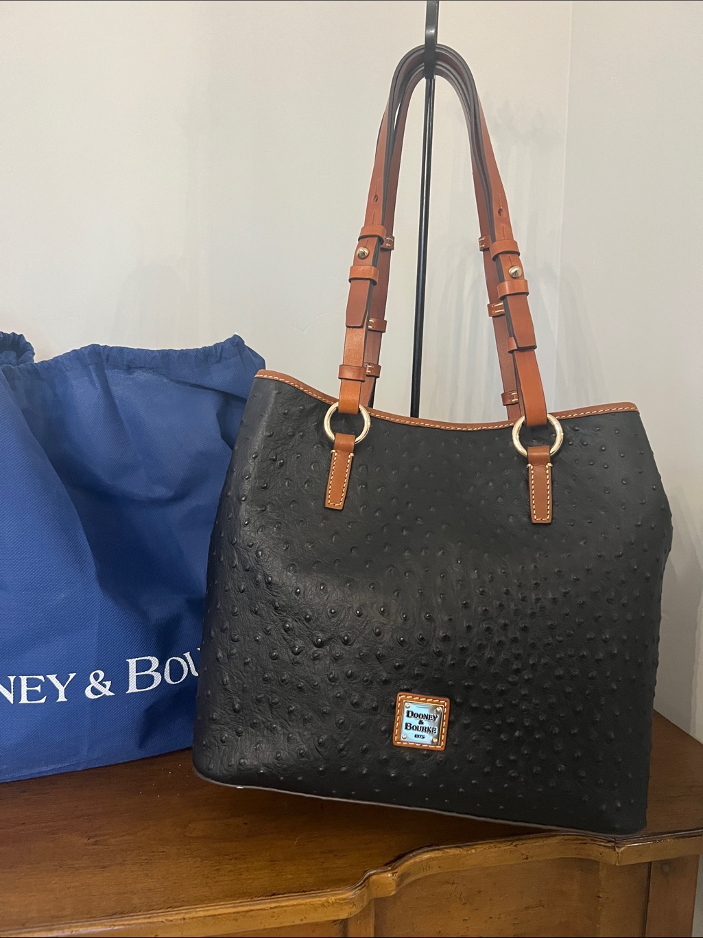 Dooney & Bourke Black Ostrich-Embossed Tote With Brown Handles